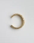 Brazalete rígido dorado texturizado
