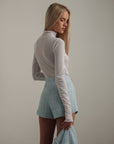 Blusa dolcevita bianco nebbia