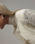 Dolcevita crema in maglia