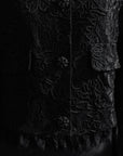 Veste noire ornée de dentelle