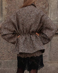 Minigonna in tweed con pizzo