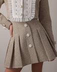 Completo in tweed con perle