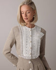 Completo in tweed con perle