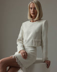 Completo in tweed con frange di perle