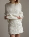 Minigonna decorata con paillettes