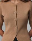 Top in maglia con bottoni