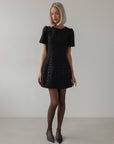 Miniabito nero con paillettes