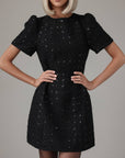 Miniabito nero con paillettes