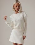 Pull scintillant orné de sequins