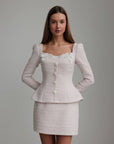 Vestido peplum de bouclé con perlas