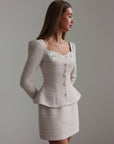 Vestido peplum de bouclé con perlas