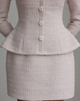 Vestido peplum de bouclé con perlas