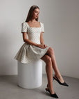 Miniabito bianco a pois stile vintage