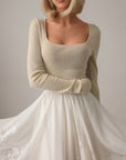 Blusa in maglia bianca con scollo quadrato