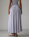 Robe longue fluide lilas à taille smockée
