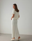 Blouse blanche texturée ornée à manches courtes