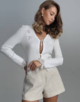 Top marfil con encaje de mariposas