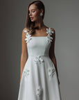 Vestido midi blanco con apliques florales