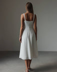 Vestido midi blanco con apliques florales