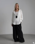 Schwarze Hose mit weitem Bein