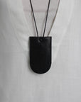 Schwarze Hose mit weitem Bein