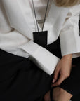 Schwarze Hose mit weitem Bein