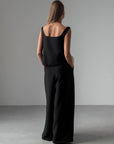 Pantalón negro elegante de pernera ancha