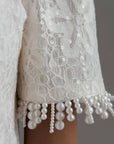 Completo elegante in pizzo bianco