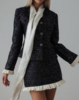 Conjunto negro de lentejuelas con encaje crema