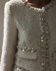 Completo avorio testurizzato con paillettes e perle