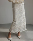 Completo top peplum e gonna in pizzo avorio