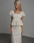 Completo top peplum e gonna in pizzo avorio