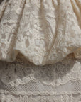 Completo top peplum e gonna in pizzo avorio