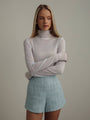 Blusa de cuello alto blanco bruma
