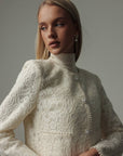 Dolcevita crema in maglia