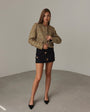 Goldene Paillettenjacke