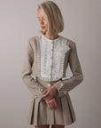 Completo in tweed con perle