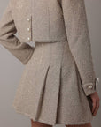 Completo in tweed con perle