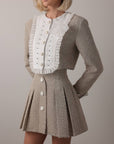Completo in tweed con perle