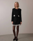 Ensemble en tweed noir à franges de perles