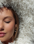 Top de hombros descubiertos efecto plumas