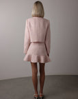 Elegantes rosa Tweed-Set mit Pailletten