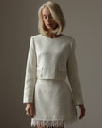 Completo in tweed con frange di perle