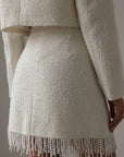 Completo in tweed con frange di perle