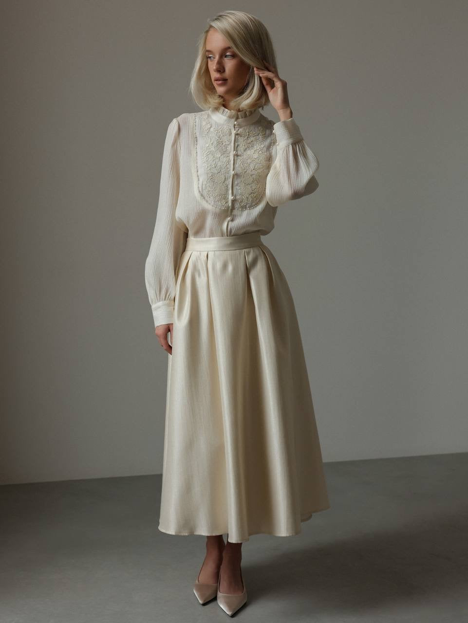 Blouse à délicats détails en dentelle
