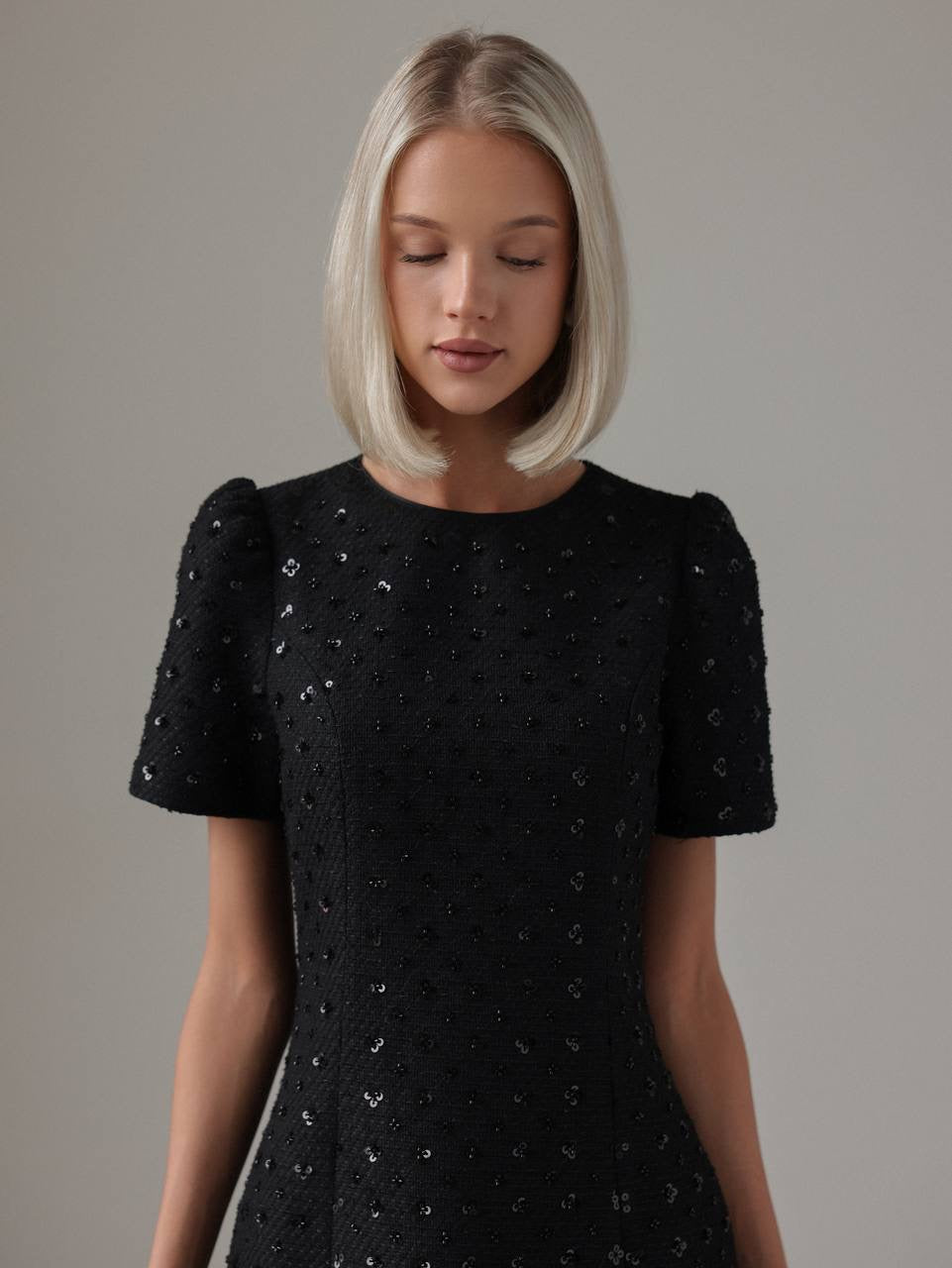 Miniabito nero con paillettes