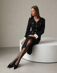 Robe midi élégante en tweed noir à boutons dorés