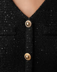 Robe midi élégante en tweed noir à boutons dorés