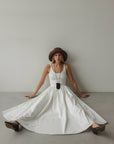 Vestido midi blanco de popelín con cuerpo acanalado
