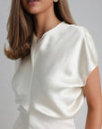 Vestido midi de satén blanco minimalista